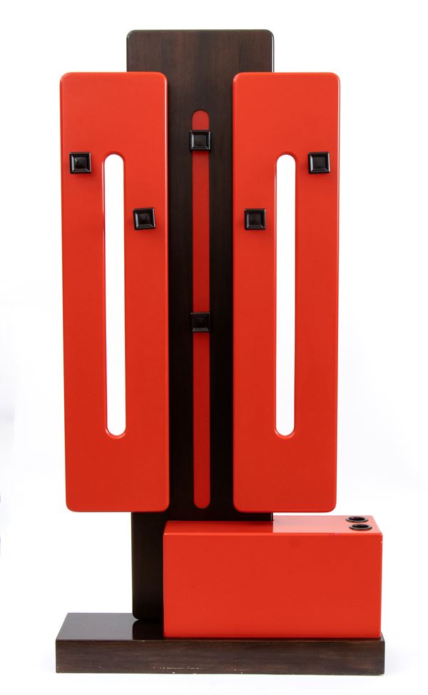 Luigi  Sormani - Space Age. Coat hanger with elements in red lacquered wood. 