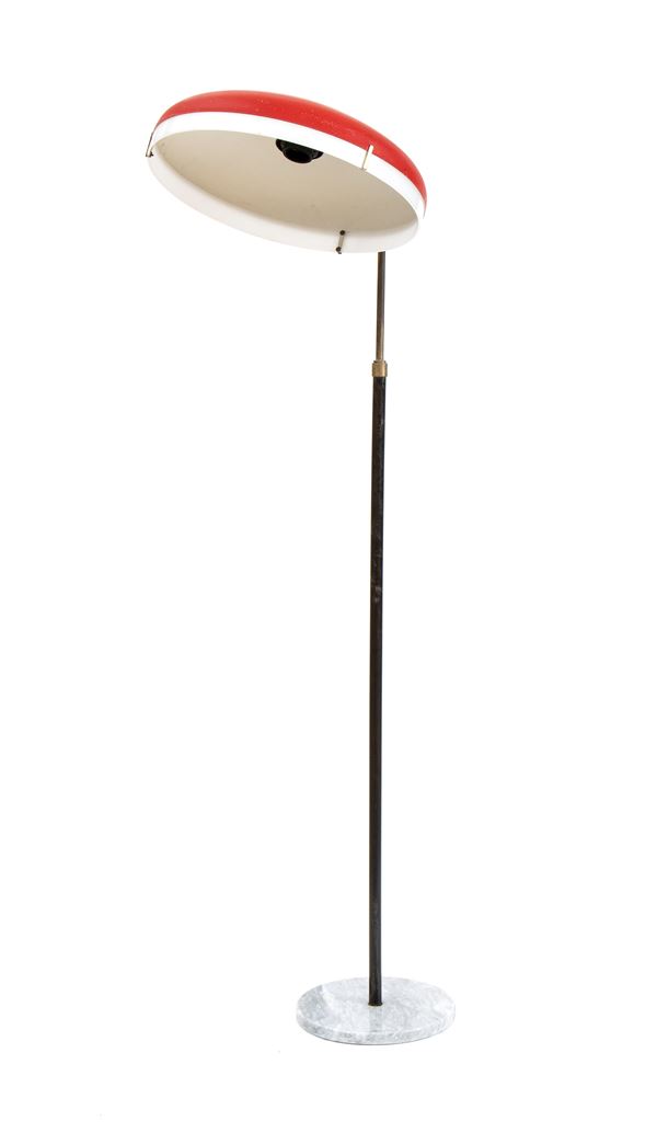 Stilnovo floor lamp with metal stem, brass and red painted metal diffuser. 