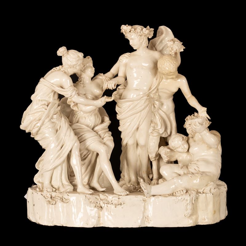 Gruppo scultoreo in terraglia raffigurante Bacco assistito dai satiri e da due menadi