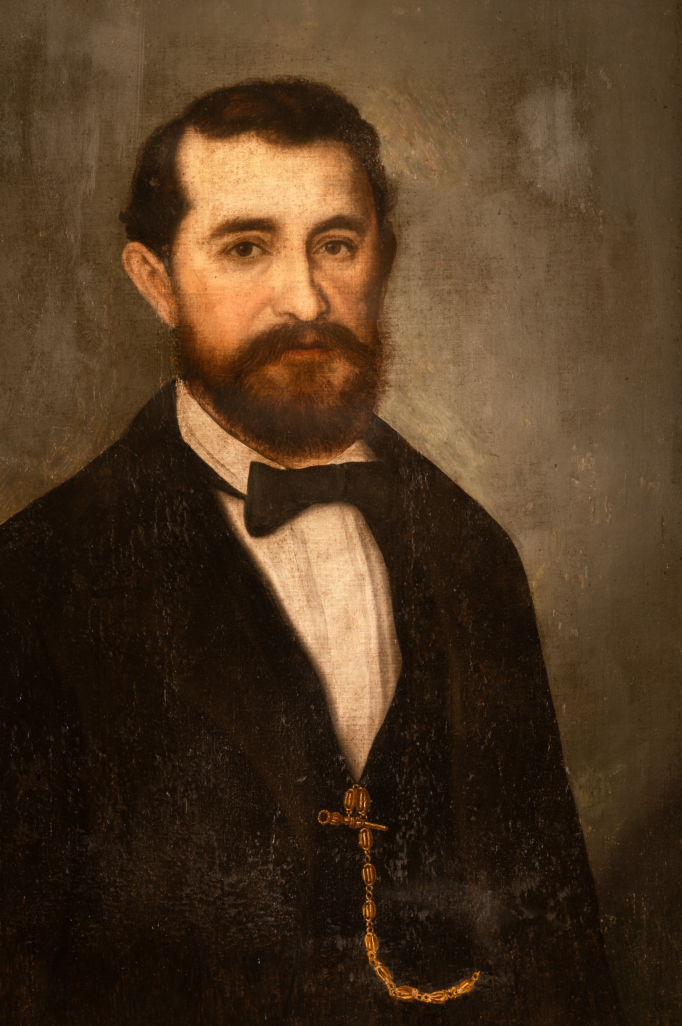 Ritratto di gentiluomo con papillon e orologio da taschino